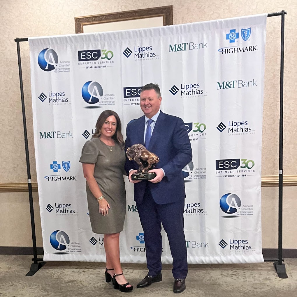 Kelton Enterprises founders, David and Allanna Beaton, celebrate the Amherst Chamber of Commerce Business of the Year Award.